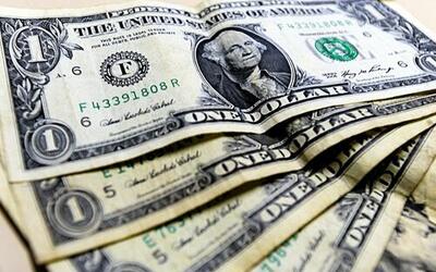 Dólar renova mínima e fecha última sessão em queda