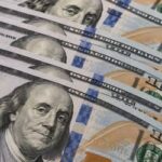 Dólar encerra sessão em baixa após declarações do Fed
